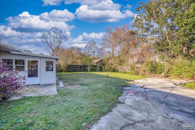 view of yard with a patio area and fence