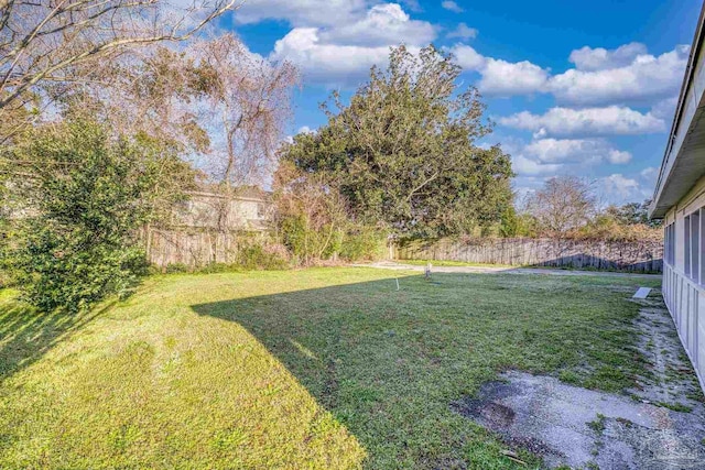 view of yard with fence