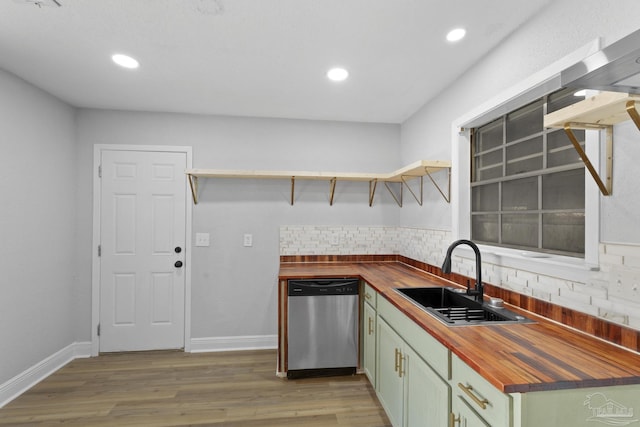 kitchen featuring a sink, open shelves, decorative backsplash, wooden counters, and dishwasher