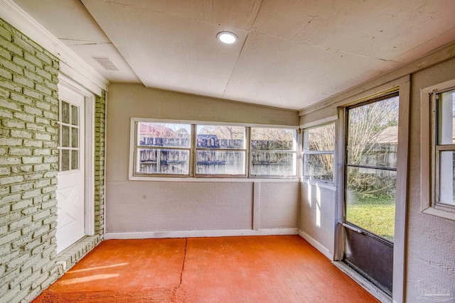 unfurnished sunroom with a wealth of natural light and visible vents