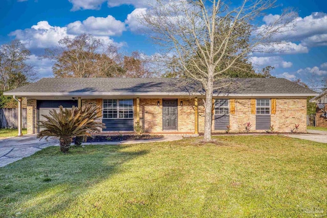 ranch-style house featuring a front yard, driveway, roof with shingles, a garage, and brick siding