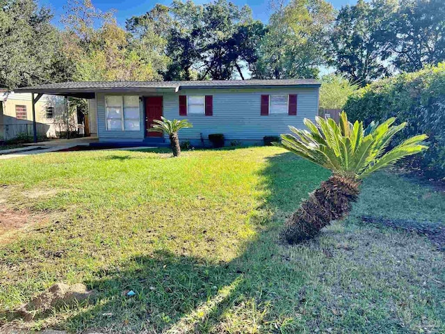 1109 Medford Ave, Pensacola, FL 32505 - view of front of house with a carport and a front lawn