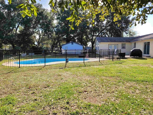 view of yard with a patio area and a fenced in pool