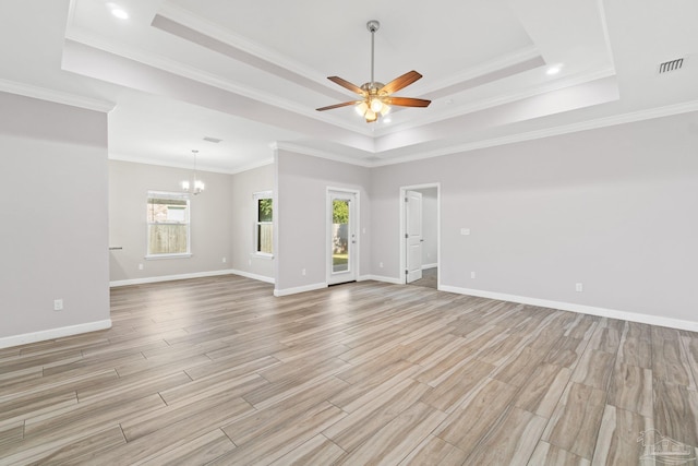 spare room with ornamental molding, light hardwood / wood-style flooring, and a healthy amount of sunlight