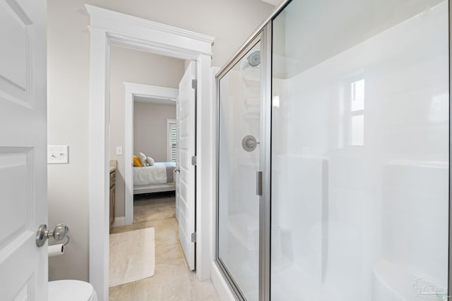 1604 Cadence Loop, Cantonment, FL 32533 - bathroom with a shower stall, ensuite bath, and toilet