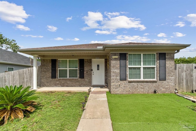 2188 Janet St, Navarre, FL 32566 - view of front facade featuring brick siding and covered porch