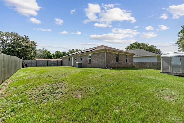2188 Janet St, Navarre, FL 32566 - fenced backyard featuring a shed