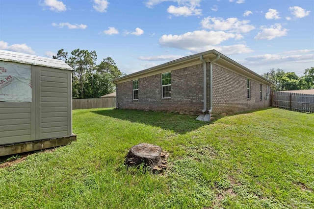 2188 Janet St, Navarre, FL 32566 - fenced backyard featuring a storage shed