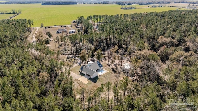 birds eye view of property with a rural view