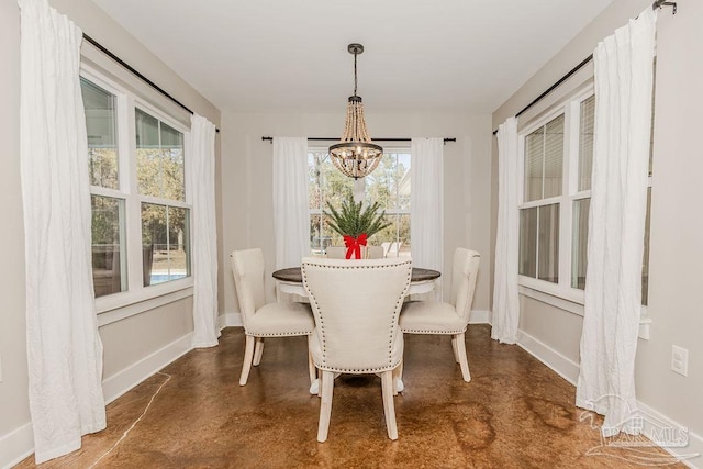 dining room featuring a chandelier