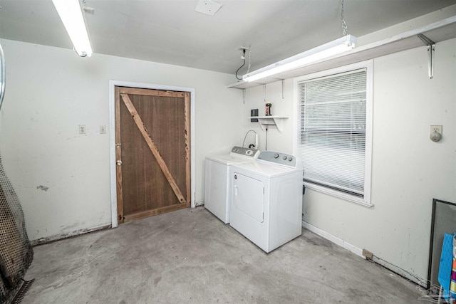 laundry area featuring separate washer and dryer