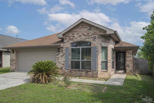 5800 Providence Loop, Pensacola, FL 32526 - view of front of property featuring driveway, an attached garage, brick siding, and a shingled roof