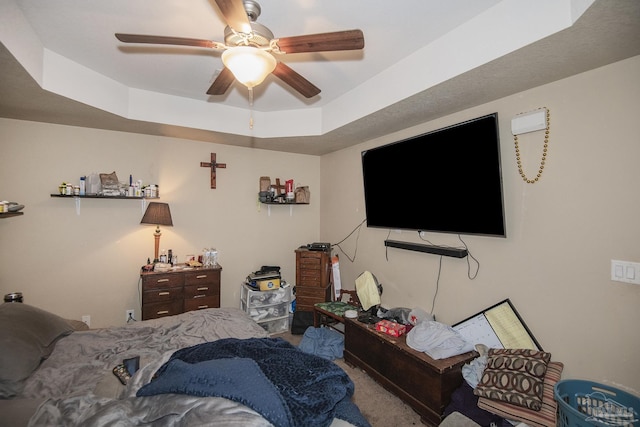 5800 Providence Loop, Pensacola, FL 32526 - carpeted bedroom with a tray ceiling and ceiling fan