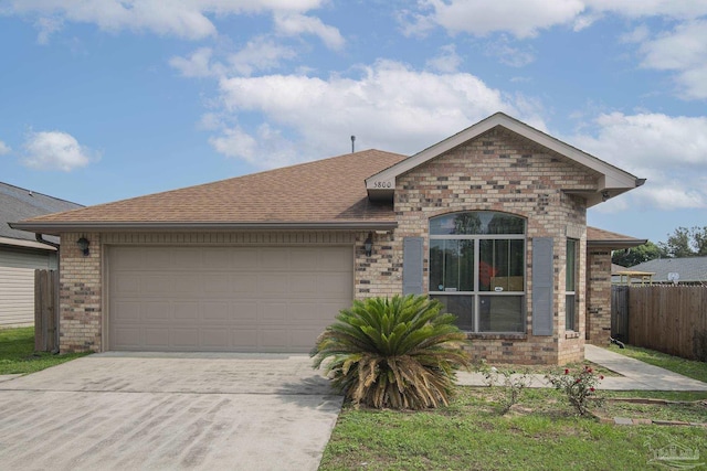 5800 Providence Loop, Pensacola, FL 32526 - single story home featuring brick siding, driveway, a garage, and roof with shingles