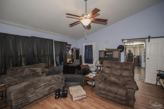 5800 Providence Loop, Pensacola, FL 32526 - living room featuring lofted ceiling, a ceiling fan, and wood finished floors