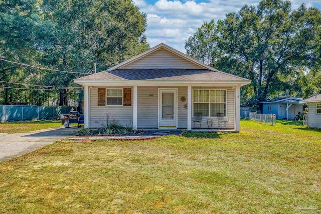 bungalow with a front yard