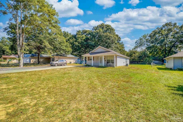 single story home featuring a front lawn