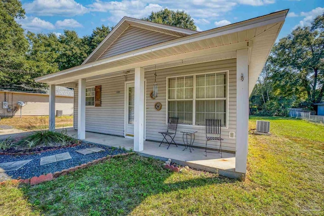 exterior space featuring a yard and central air condition unit