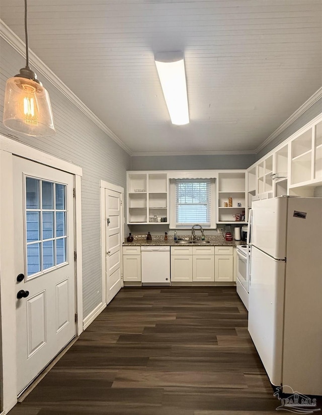 kitchen with white appliances, dark countertops, crown molding, open shelves, and a sink