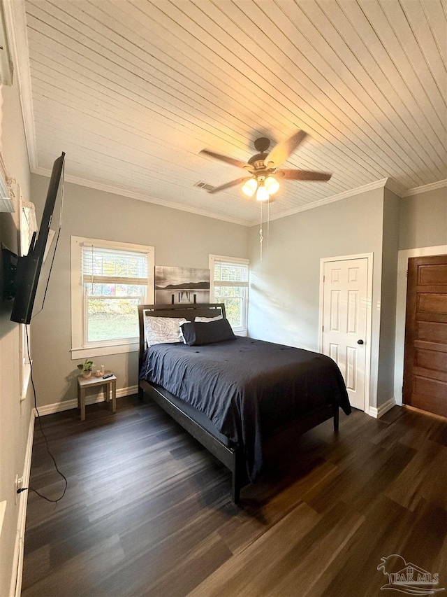 bedroom with dark wood-style flooring, wooden ceiling, crown molding, and baseboards