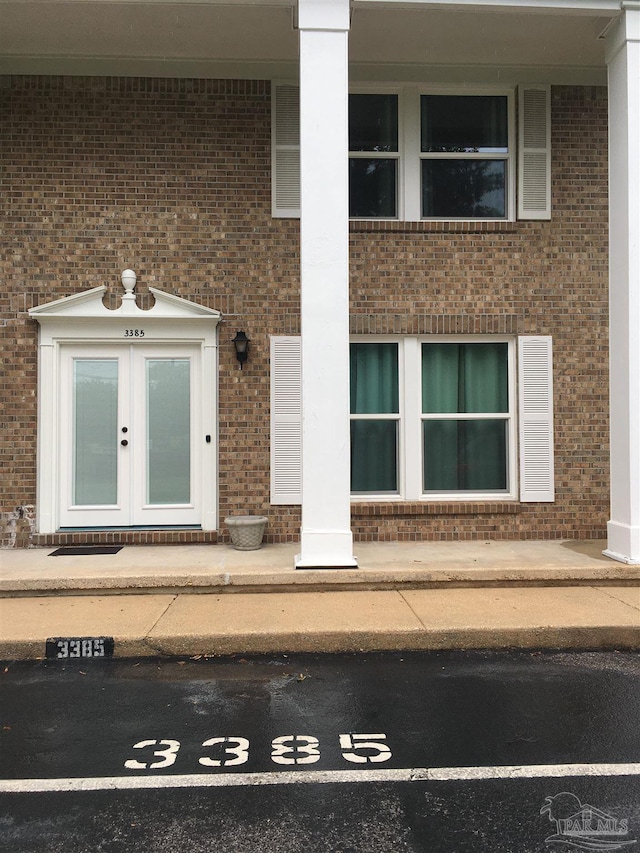 3385 Olive Rd Unit 2-D, Pensacola, FL 32514 - entrance to property featuring french doors and brick siding