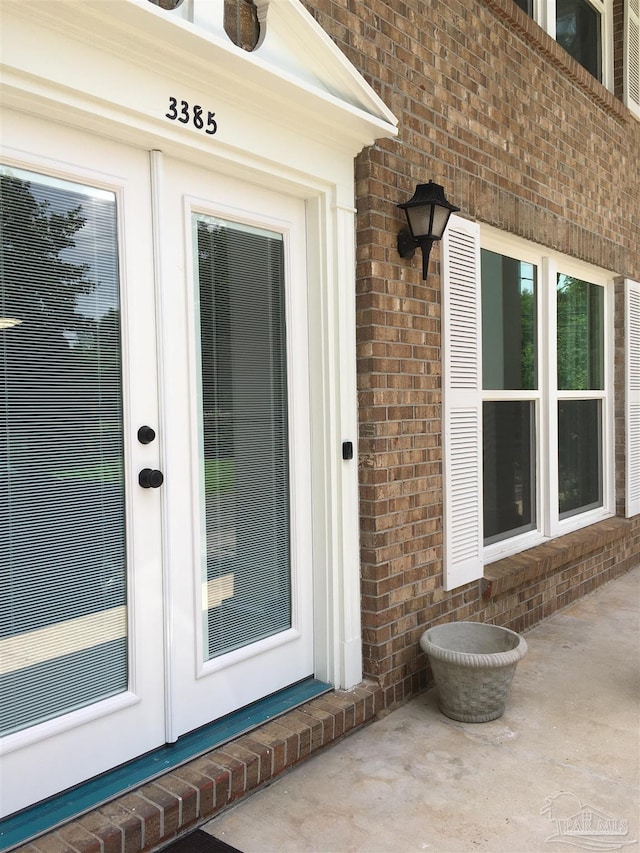 3385 Olive Rd Unit 2-D, Pensacola, FL 32514 - view of exterior entry with brick siding