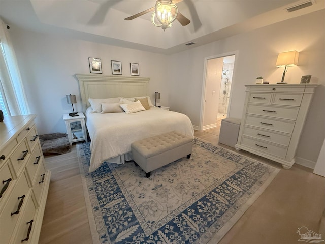 1450 N 11th Ave, Pensacola, FL 32503 - bedroom with light wood-style floors and ceiling fan
