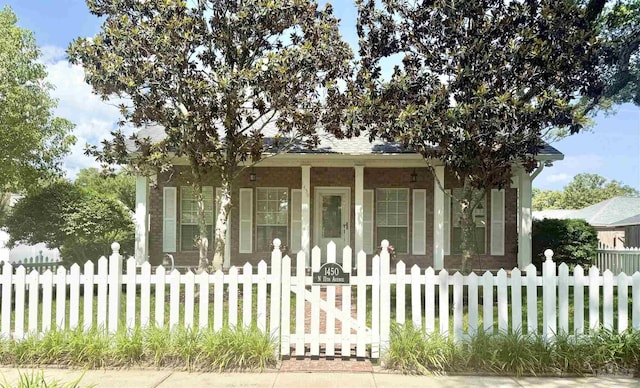 1450 N 11th Ave, Pensacola, FL 32503 - view of front of home featuring a porch and a fenced front yard