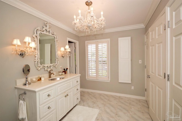 bathroom with a notable chandelier, vanity, and ornamental molding