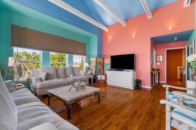 living room featuring beam ceiling, high vaulted ceiling, and hardwood / wood-style flooring