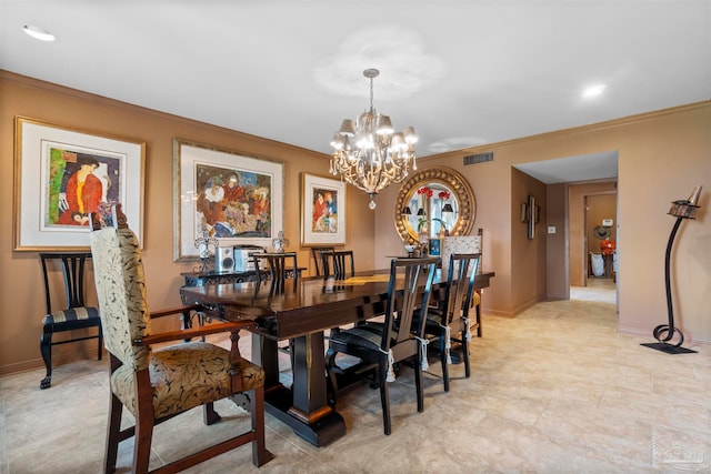 dining room with a chandelier and ornamental molding