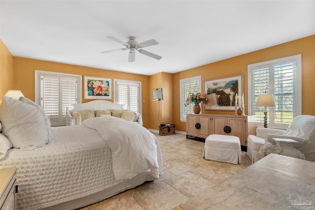 bedroom featuring ceiling fan