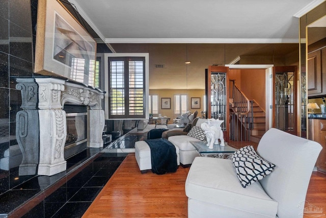 living room featuring crown molding