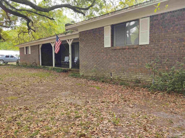 view of front of home with brick siding