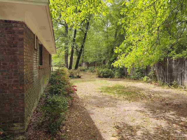 view of yard featuring fence