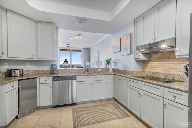 13621 Perdido Key Dr Unit 1504-E, Perdido Key, FL 32507 - kitchen featuring a sink, stainless steel appliances, light tile patterned floors, tasteful backsplash, and under cabinet range hood
