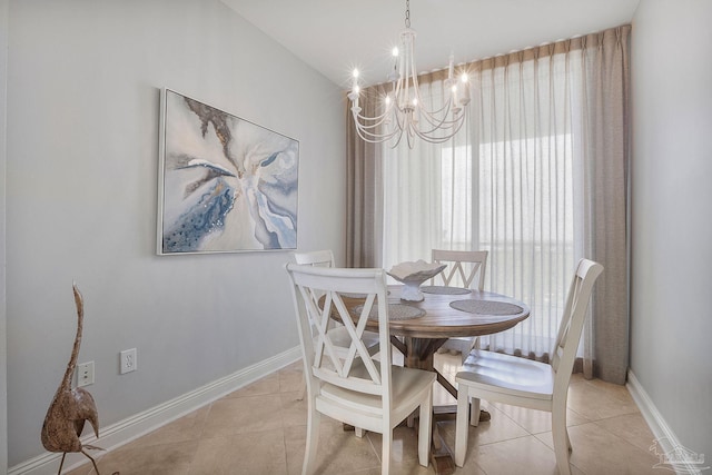 13621 Perdido Key Dr Unit 1504-E, Perdido Key, FL 32507 - dining room with light tile patterned flooring, baseboards, and an inviting chandelier