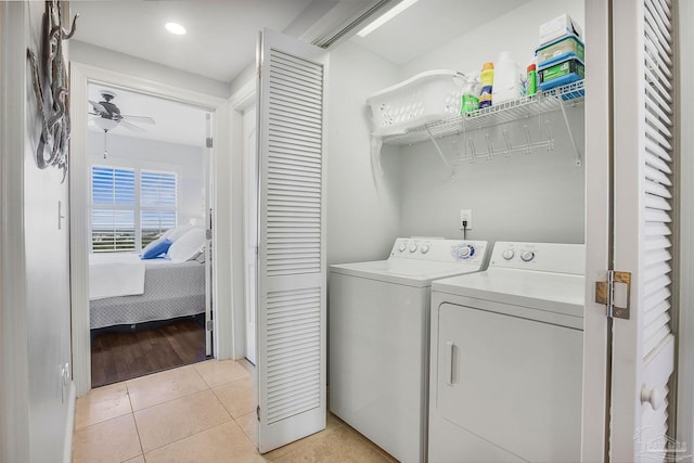 13621 Perdido Key Dr Unit 1504-E, Perdido Key, FL 32507 - washroom featuring laundry area, ceiling fan, washing machine and dryer, and light tile patterned floors