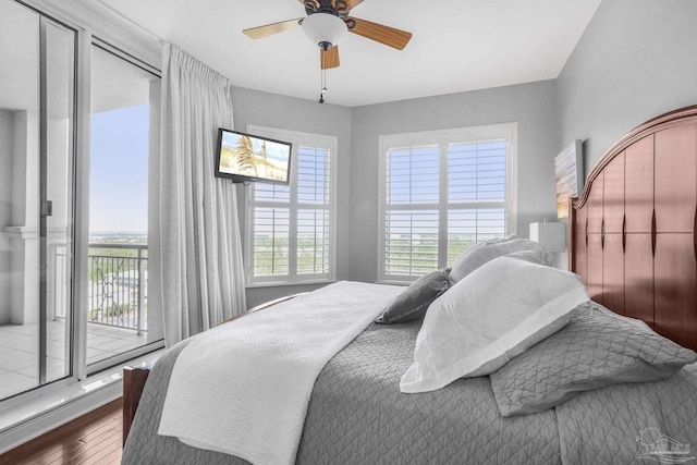 13621 Perdido Key Dr Unit 1504-E, Perdido Key, FL 32507 - bedroom featuring access to outside, a ceiling fan, and wood finished floors