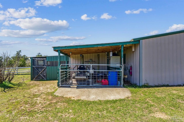 view of outbuilding featuring an outdoor structure and an exterior structure