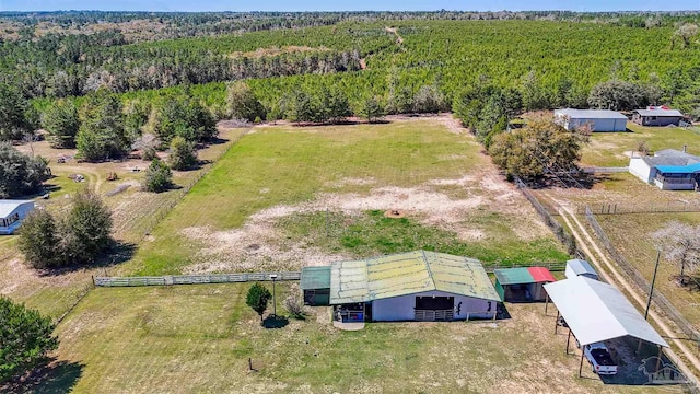 drone / aerial view with a view of trees