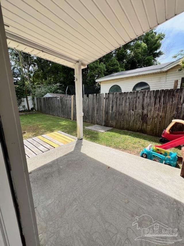 view of patio with a fenced backyard