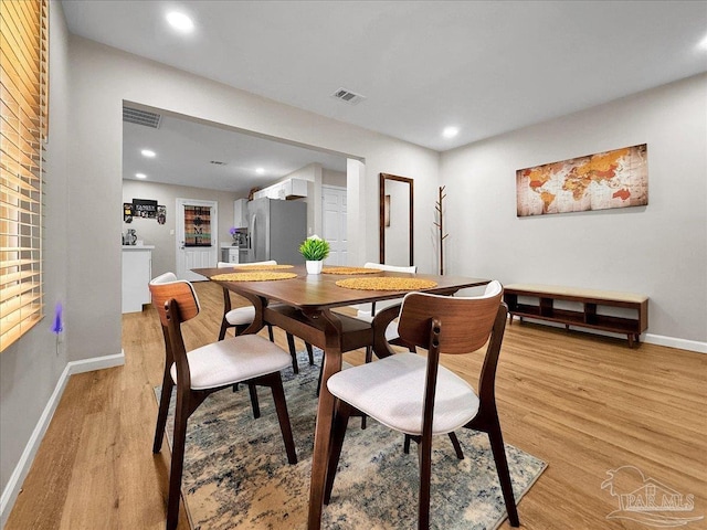 202 Henry St, Pensacola, FL 32507 - dining space featuring light wood-style floors, baseboards, and recessed lighting