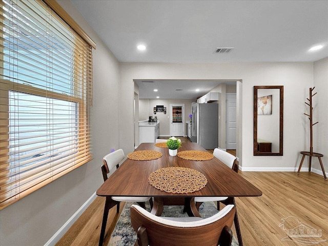 202 Henry St, Pensacola, FL 32507 - dining space featuring baseboards, light wood-style flooring, and recessed lighting