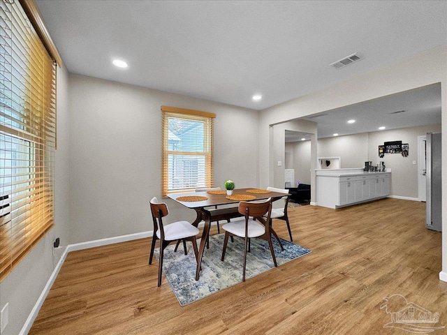 202 Henry St, Pensacola, FL 32507 - dining room with light wood-type flooring, baseboards, and recessed lighting