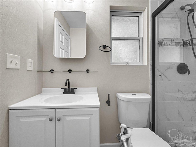 202 Henry St, Pensacola, FL 32507 - bathroom with vanity, a tile shower, and toilet
