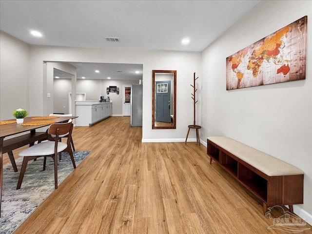 202 Henry St, Pensacola, FL 32507 - dining space with light wood-style floors, baseboards, and recessed lighting