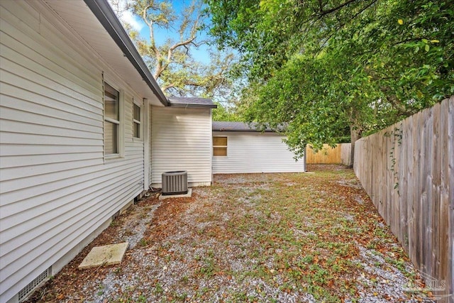 202 Henry St, Pensacola, FL 32507 - fenced backyard featuring central AC