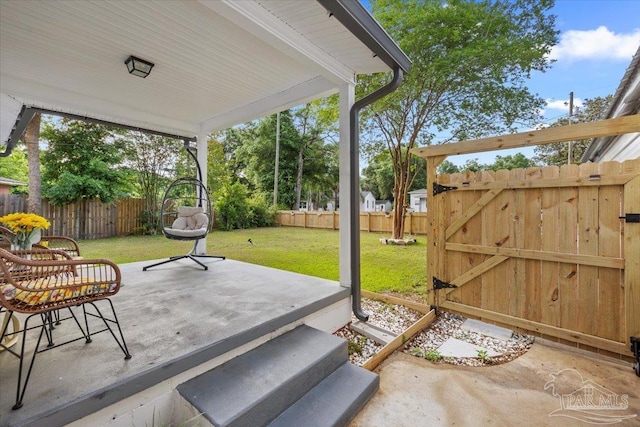 202 Henry St, Pensacola, FL 32507 - view of patio featuring a gate