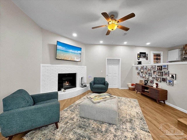 202 Henry St, Pensacola, FL 32507 - living area with a ceiling fan, baseboards, wood finished floors, a fireplace, and recessed lighting